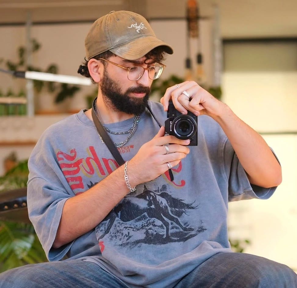 Roy Kedem holding a camera
